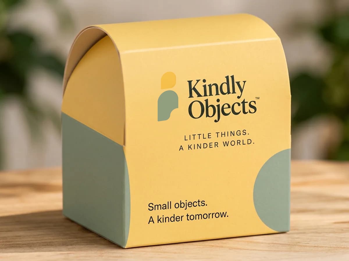 Buttercup and sage small objects box with Kindly Objects branding — AI concept render
